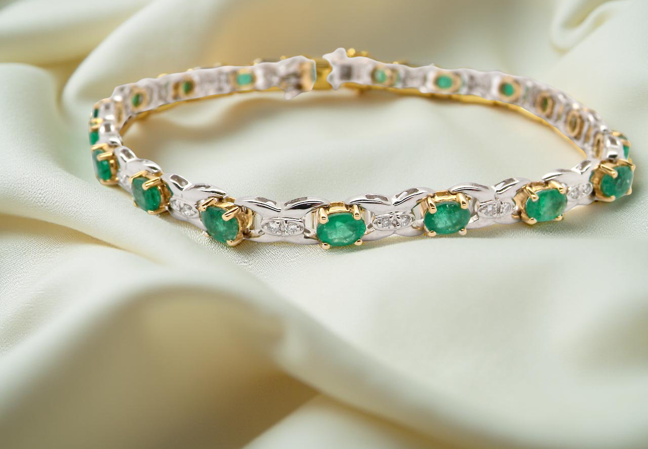 A white gold Emerald and Diamond bracelet