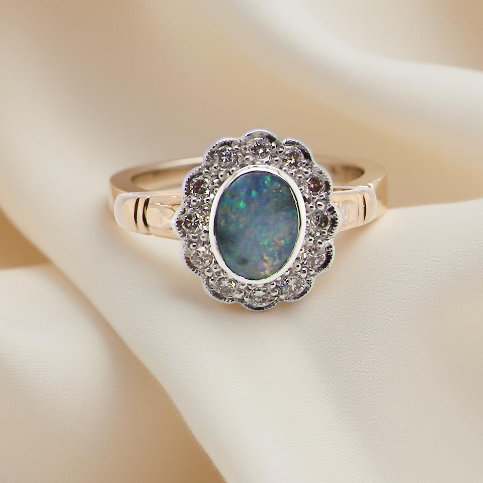 A pretty Opal and Diamond cluster ring