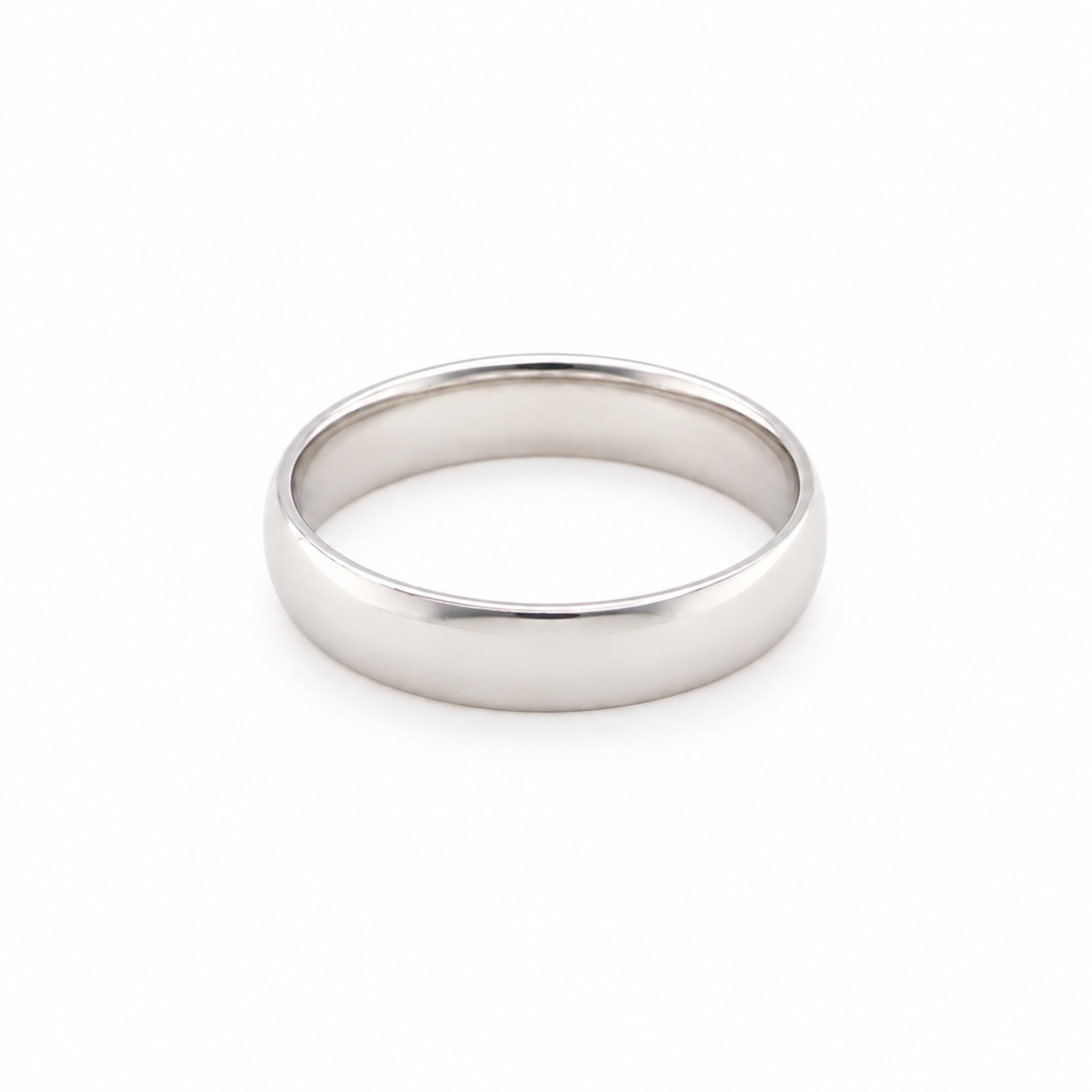 A classic flat-band wedding ring in polished metal, shown on a clean white background.