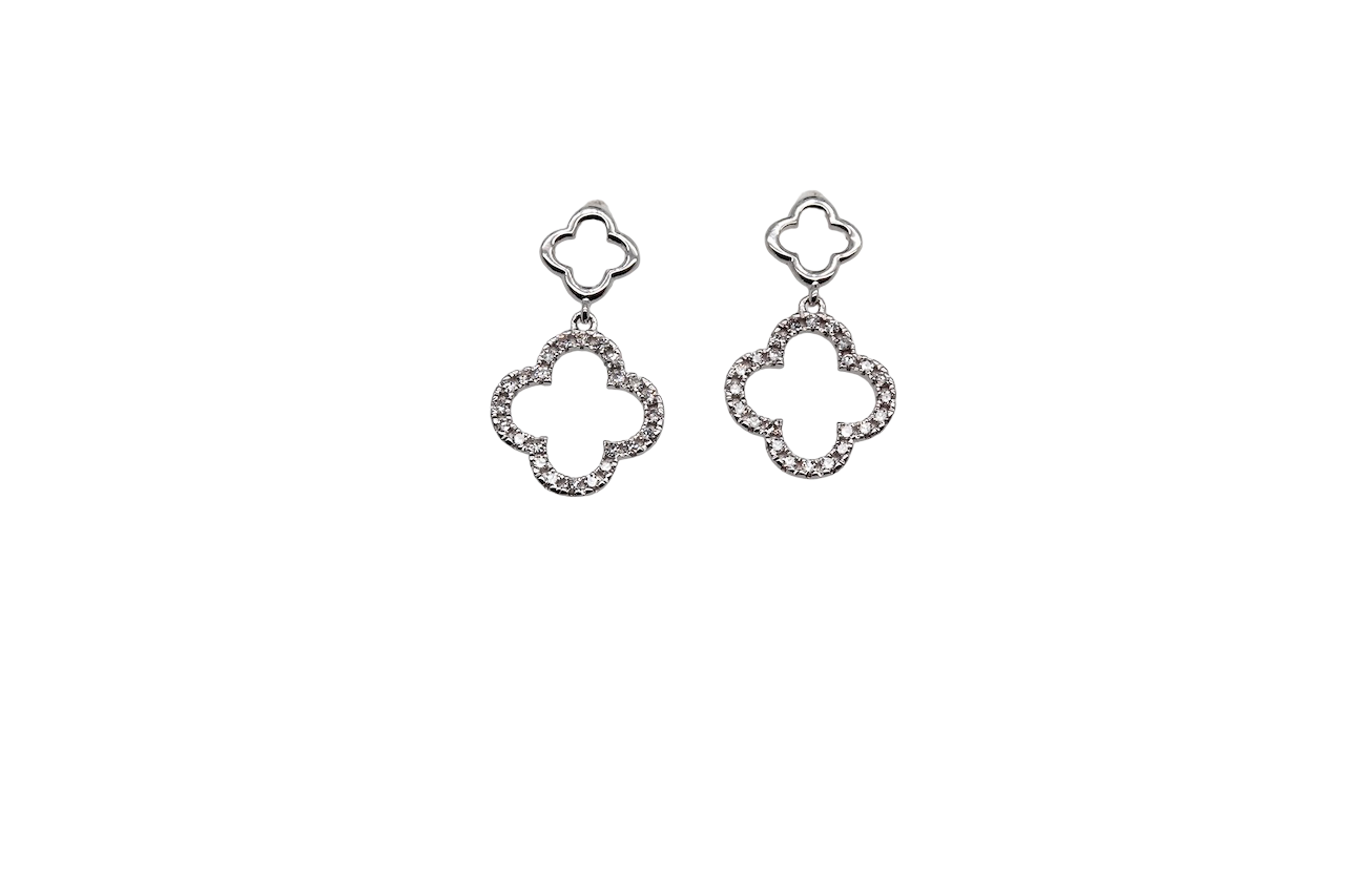 Each earring is set with brilliant cut white diamonds, to a total of 0.51 carats. 