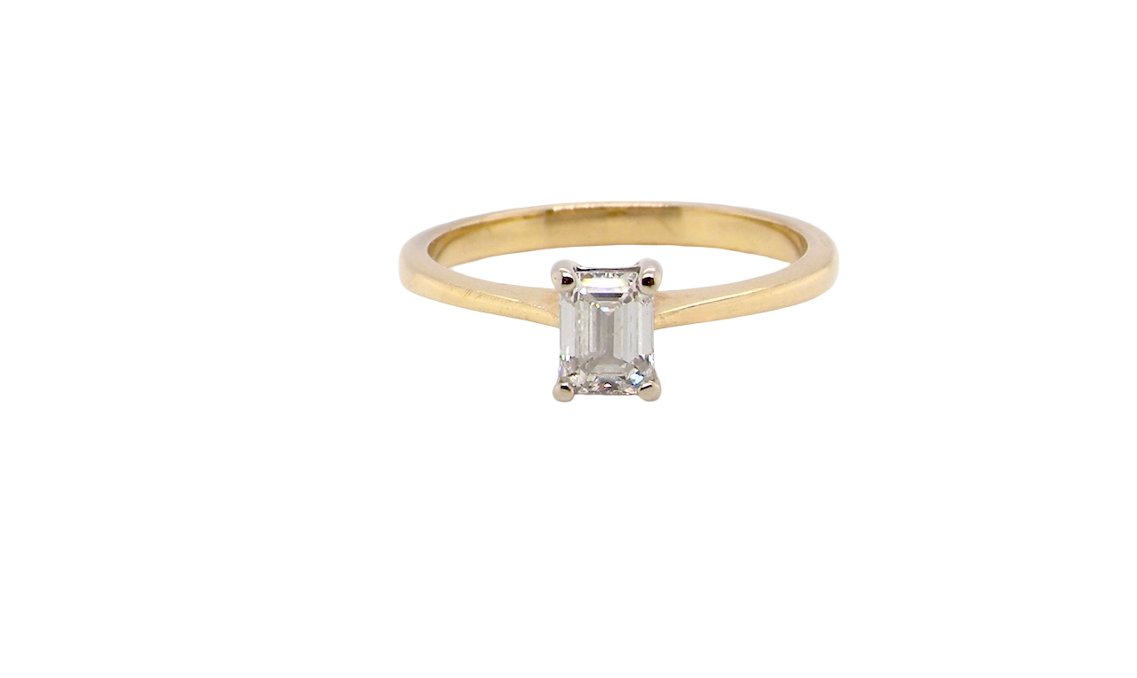 Elegant and timeless, this solitaire ring features a beautifully cut emerald-cut diamond measuring 5 x 4mm, confirmed at approximately 0.40 carats. The diamond is graded J colour and VS clarity, offering excellent sparkle and impressive clarity for everyday wear or a meaningful occasion piece.