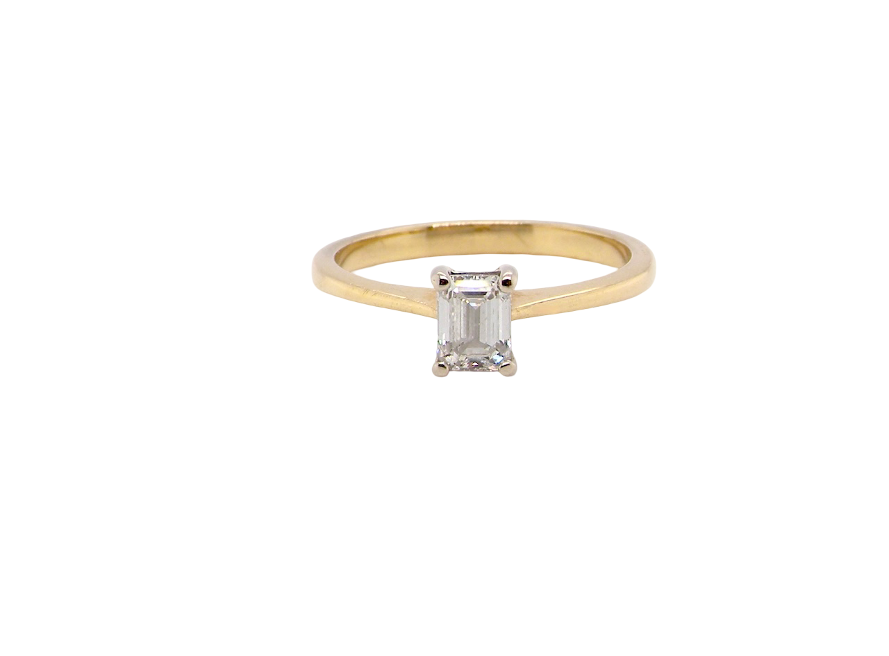 Elegant and timeless, this solitaire ring features a beautifully cut emerald-cut diamond measuring 5 x 4mm, confirmed at approximately 0.40 carats. The diamond is graded J colour and VS clarity, offering excellent sparkle and impressive clarity for everyday wear or a meaningful occasion piece.