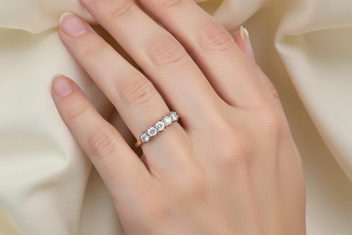 A Seven-Stone Half Hoop Diamond Ring