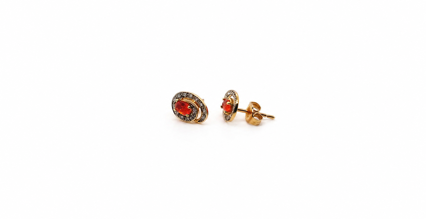 Pair of earrings with fire opals on a white background side view