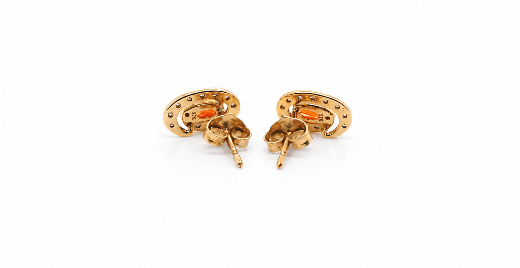 Pair of earrings with fire opals on a white background reverse view