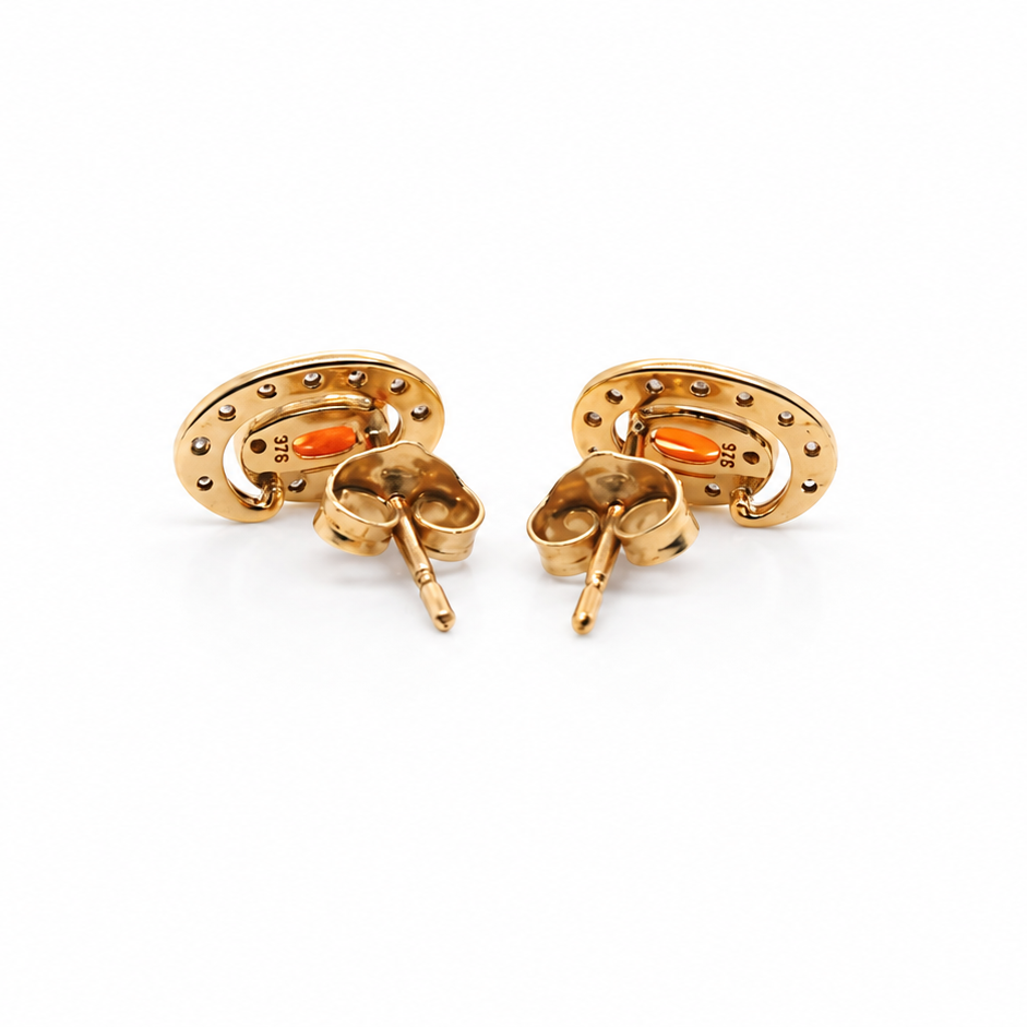 Pair of earrings with fire opals on a white background reverse view
