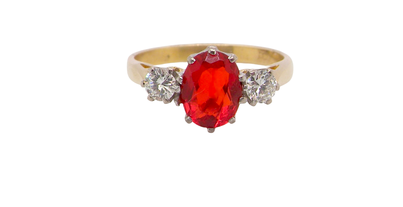 this stunning ring is just for you! A vibrant fireglow orange opal sets this ring apart form the everyday norm!