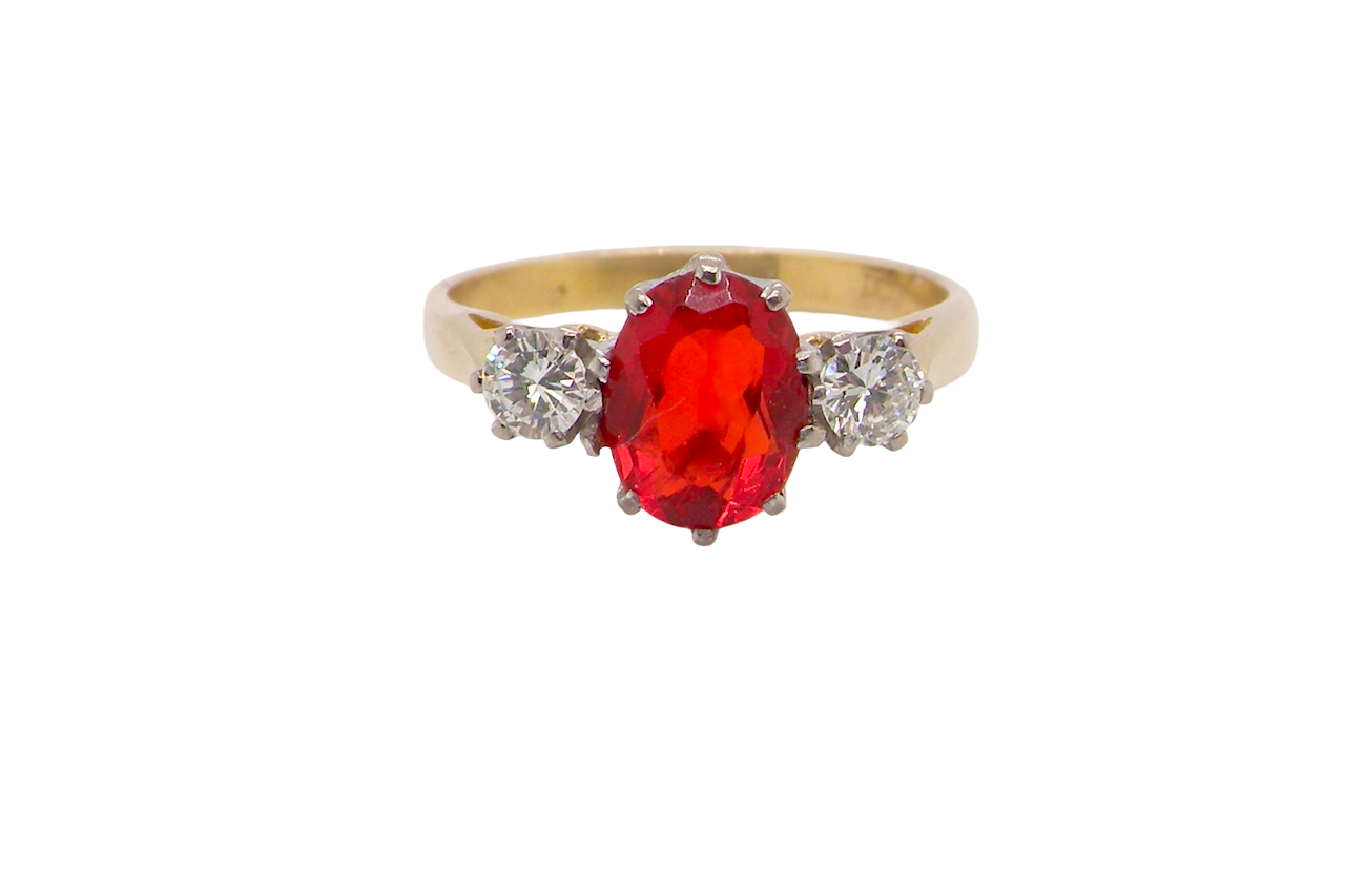 this stunning ring is just for you! A vibrant fireglow orange opal sets this ring apart form the everyday norm!