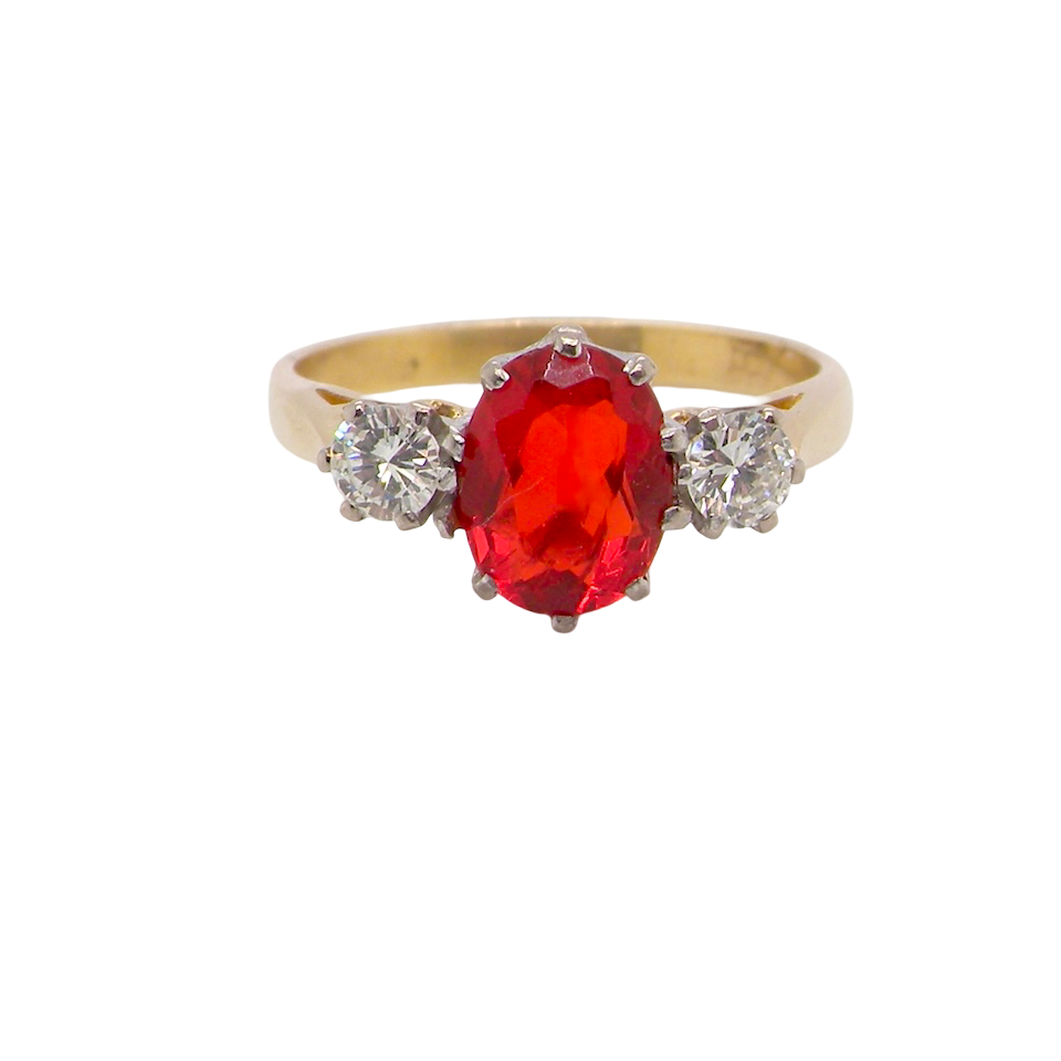 this stunning ring is just for you! A vibrant fireglow orange opal sets this ring apart form the everyday norm!