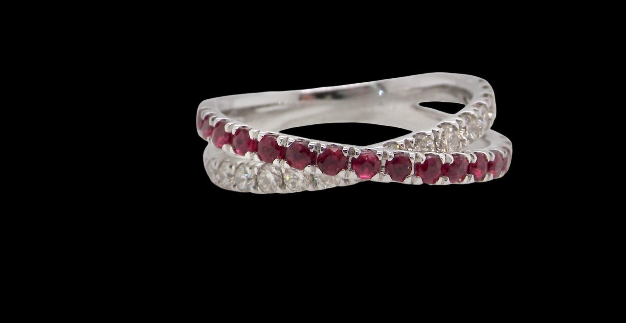 A NEW ruby and diamond cross over ring