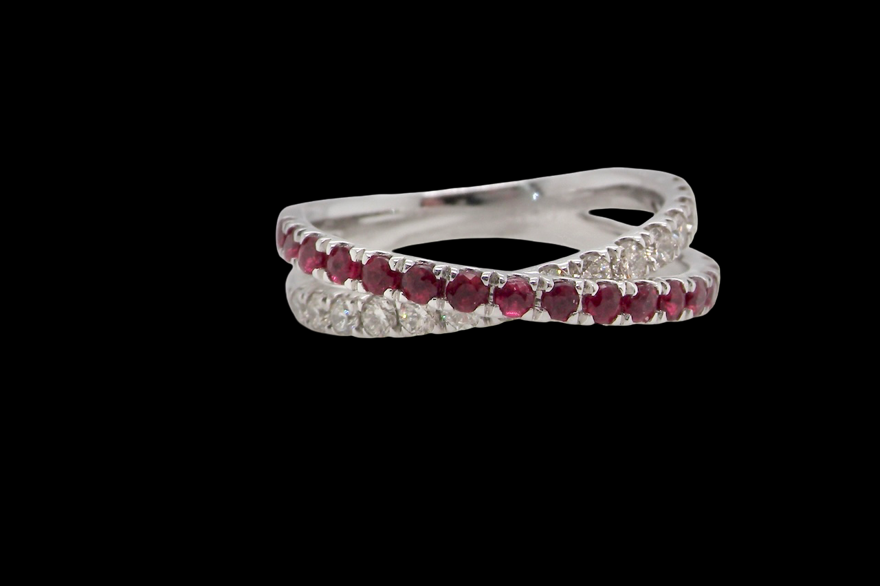 A NEW ruby and diamond cross over ring
