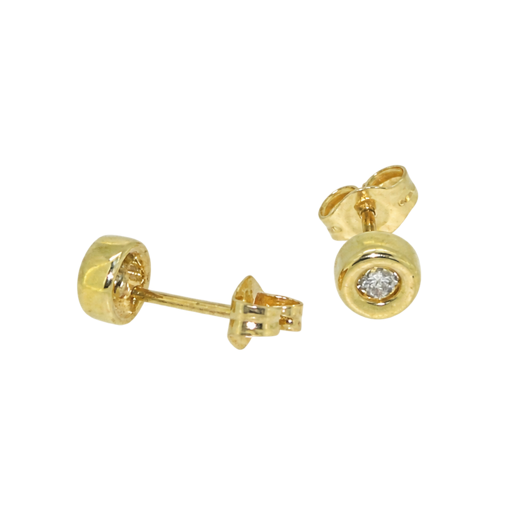 A pair of rim set diamond earrings
