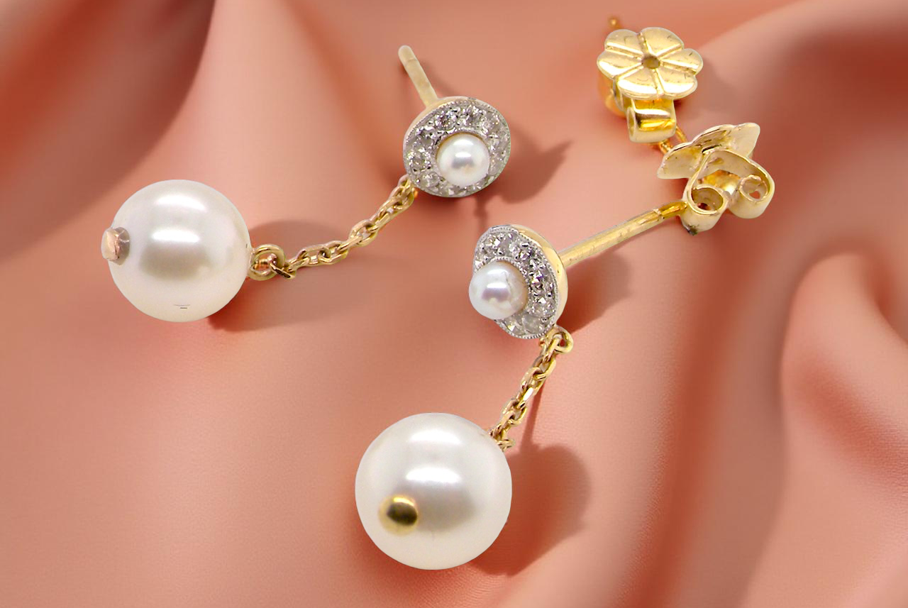 pair pearl and diamond drop earrings