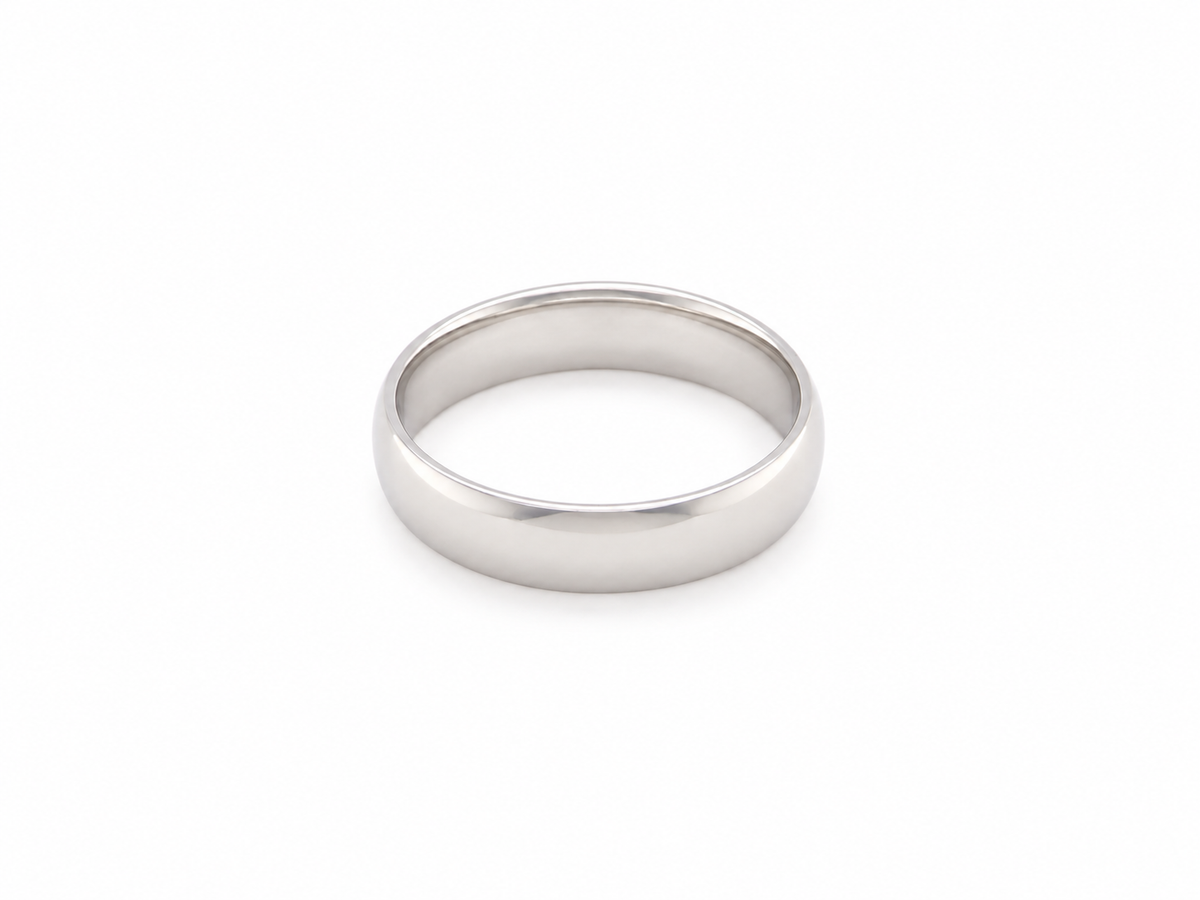 A classic flat band wedding ring in polished white gold metal, shown on a clean white background.