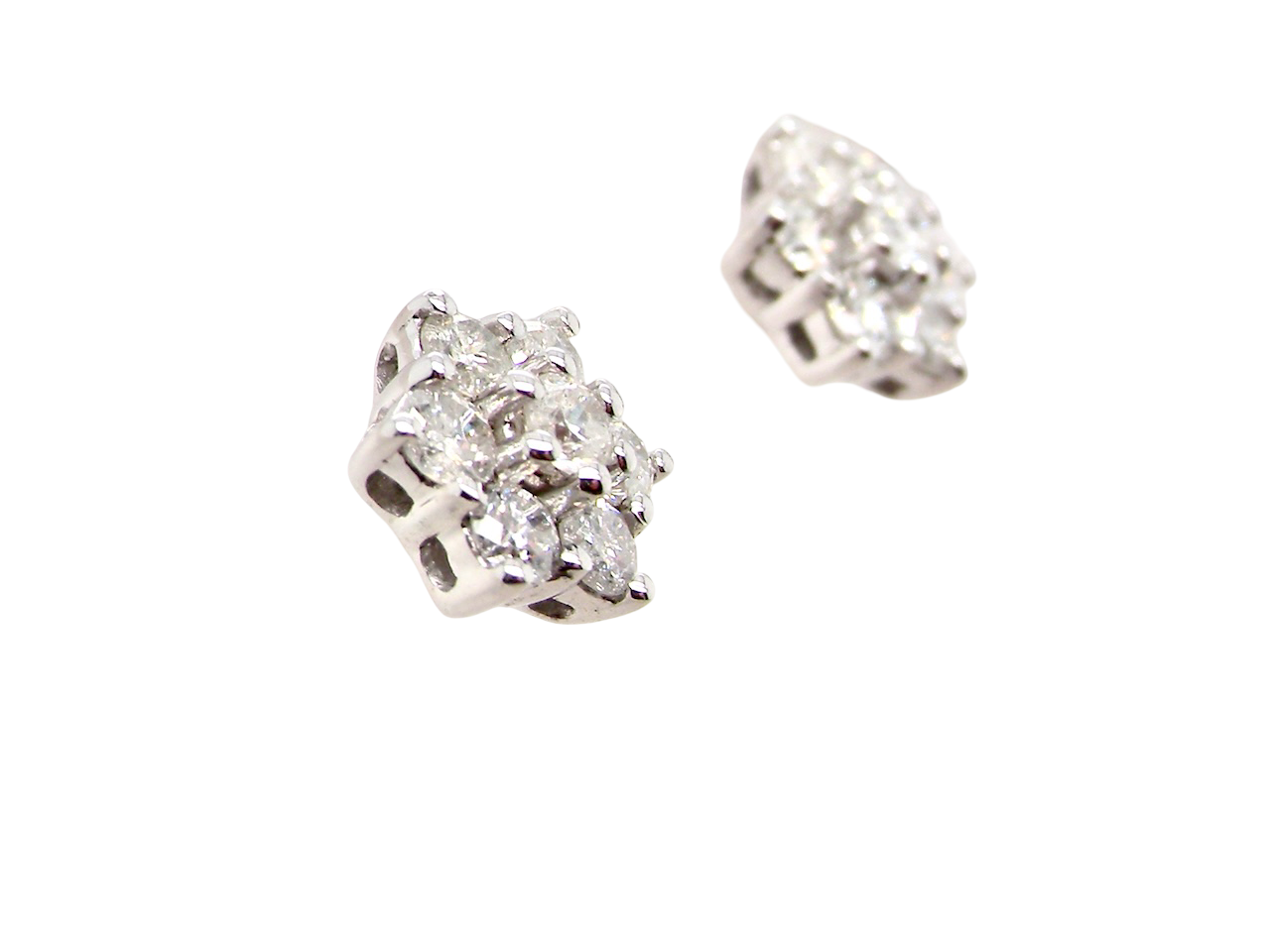 single A fine pair of 9 carat white gold diamond stud earrings. 