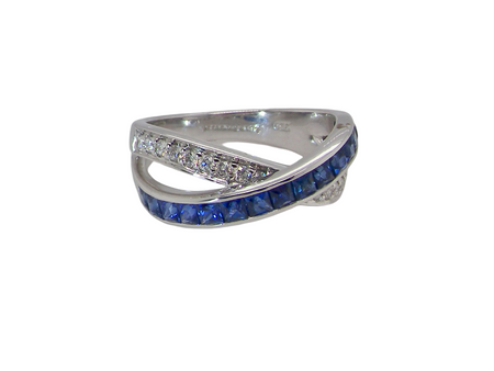 A NEW Sapphire and Diamond cross over ring