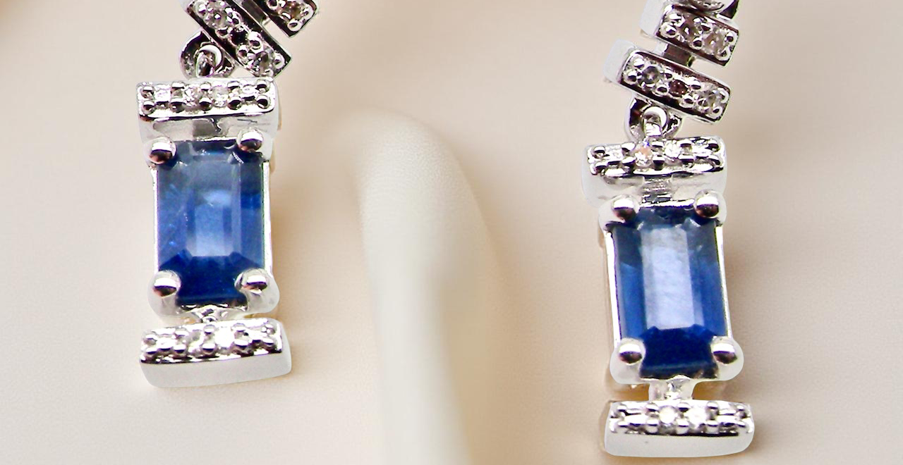 A NEW pair of Sapphire and Diamond drop earrings