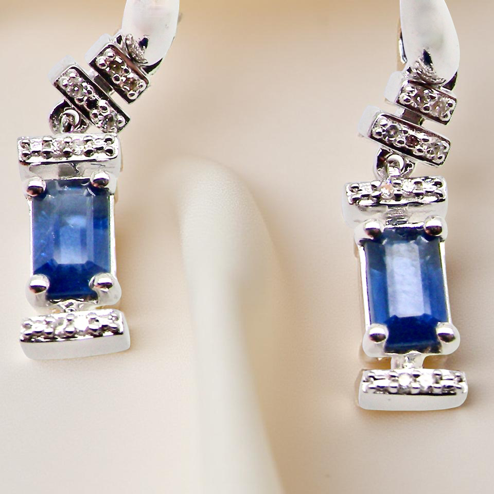 A NEW pair of Sapphire and Diamond drop earrings
