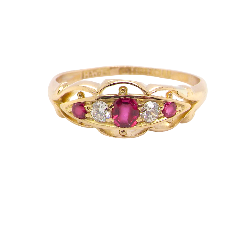Set with three bright rubies, centre 3x2.6mm, each end a 2mm ruby. Each side of the centre stone an old brilliant cut white diamond 2.8mm (est 0.08 carats) . Head measures 17x7mm, 3.4grams. 