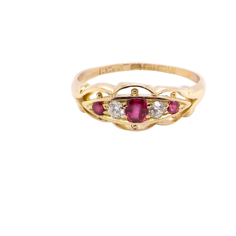 Set with three bright rubies, centre 3x2.6mm, each end a 2mm ruby. Each side of the centre stone an old brilliant cut white diamond 2.8mm (est 0.08 carats) . Head measures 17x7mm, weight 3.4grams. 