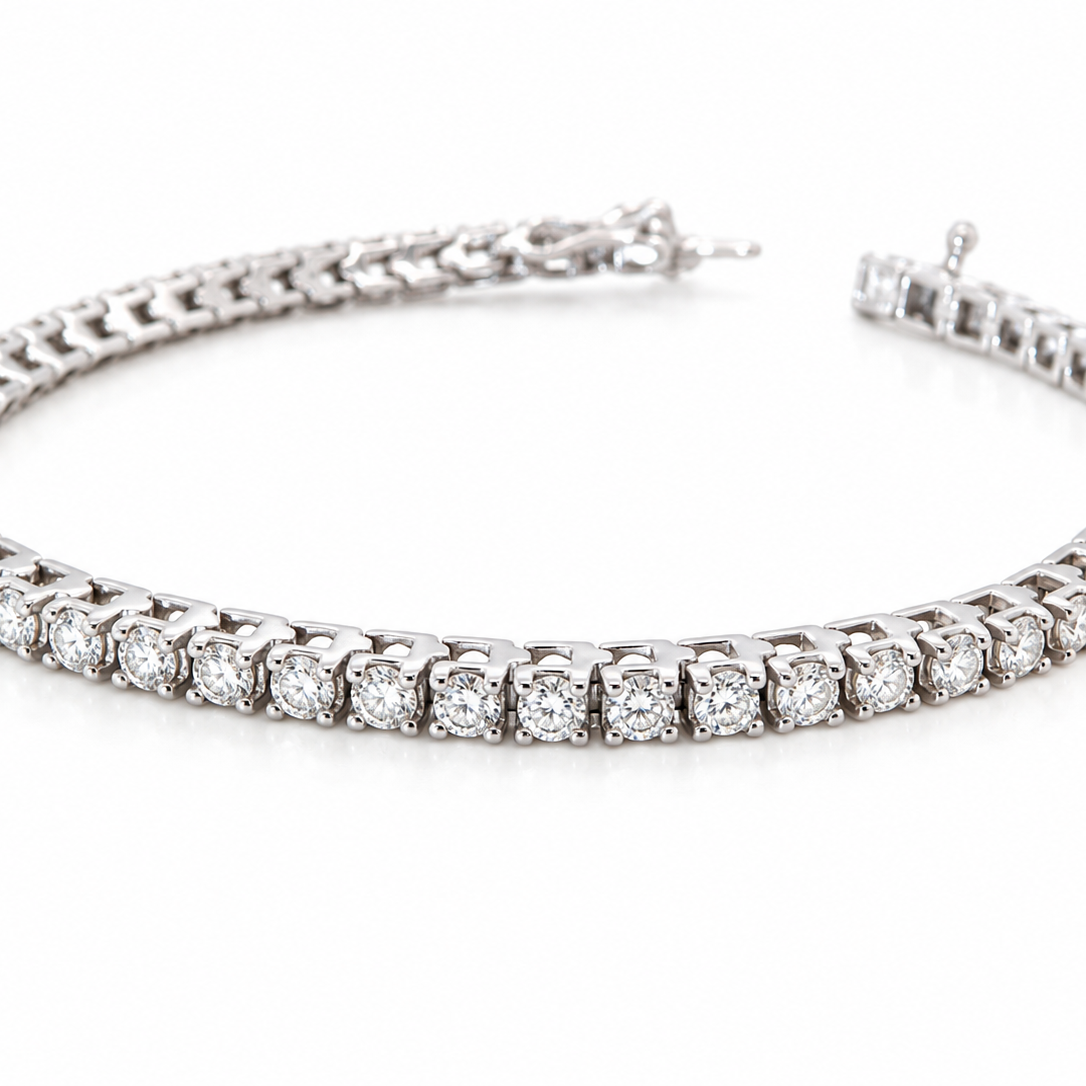 A tennis bracelet set with approximately sixty brilliant cut white diamonds to a total carat weight estimated at 3.50 carats.