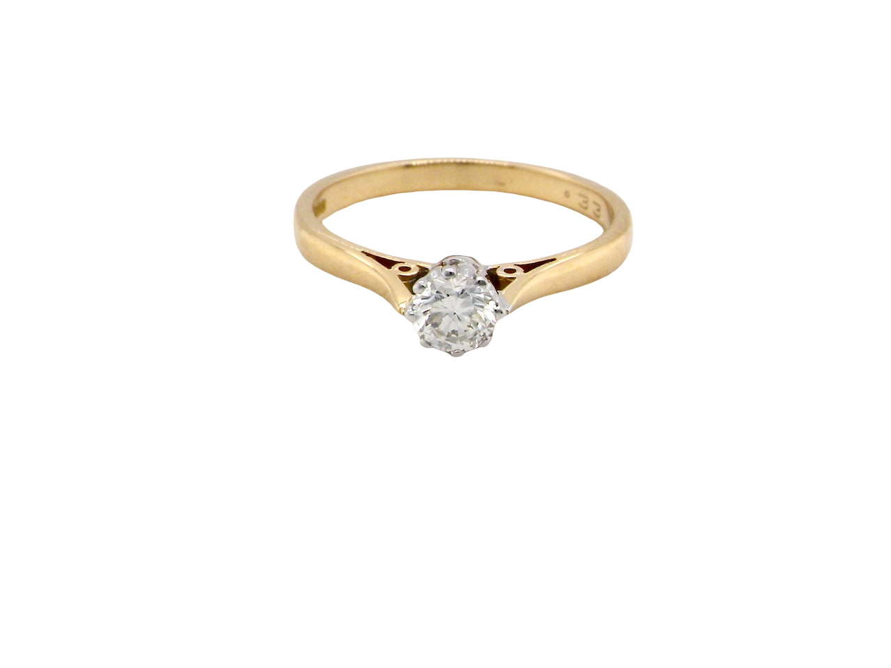 Gold ring with a diamond on a white background