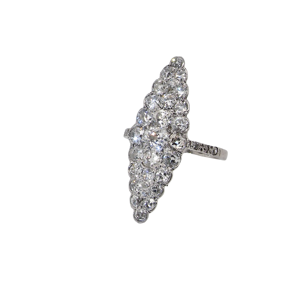 This is a striking marquise-shaped diamond cluster ring with a classic, vintage-inspired look.