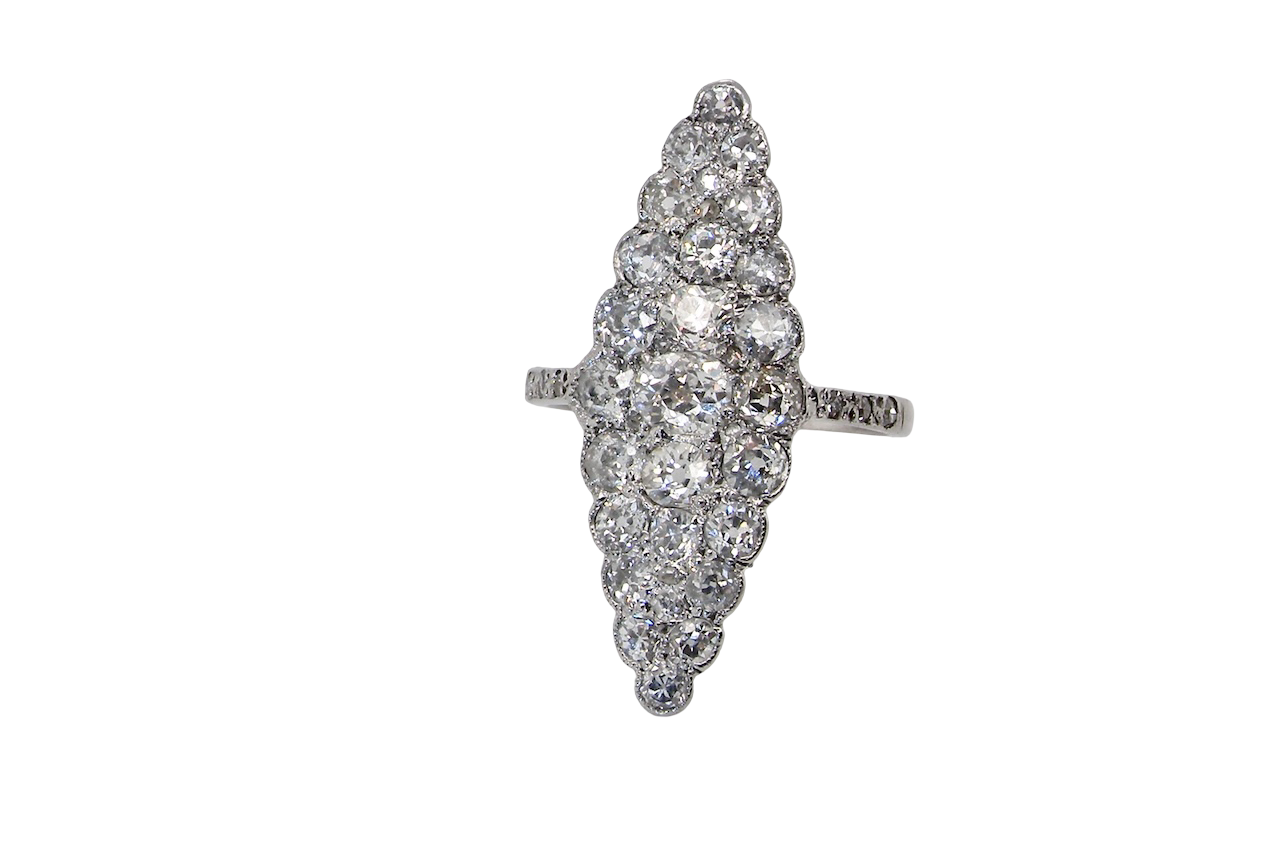 This is a striking marquise-shaped diamond cluster ring with a very classic, vintage look.