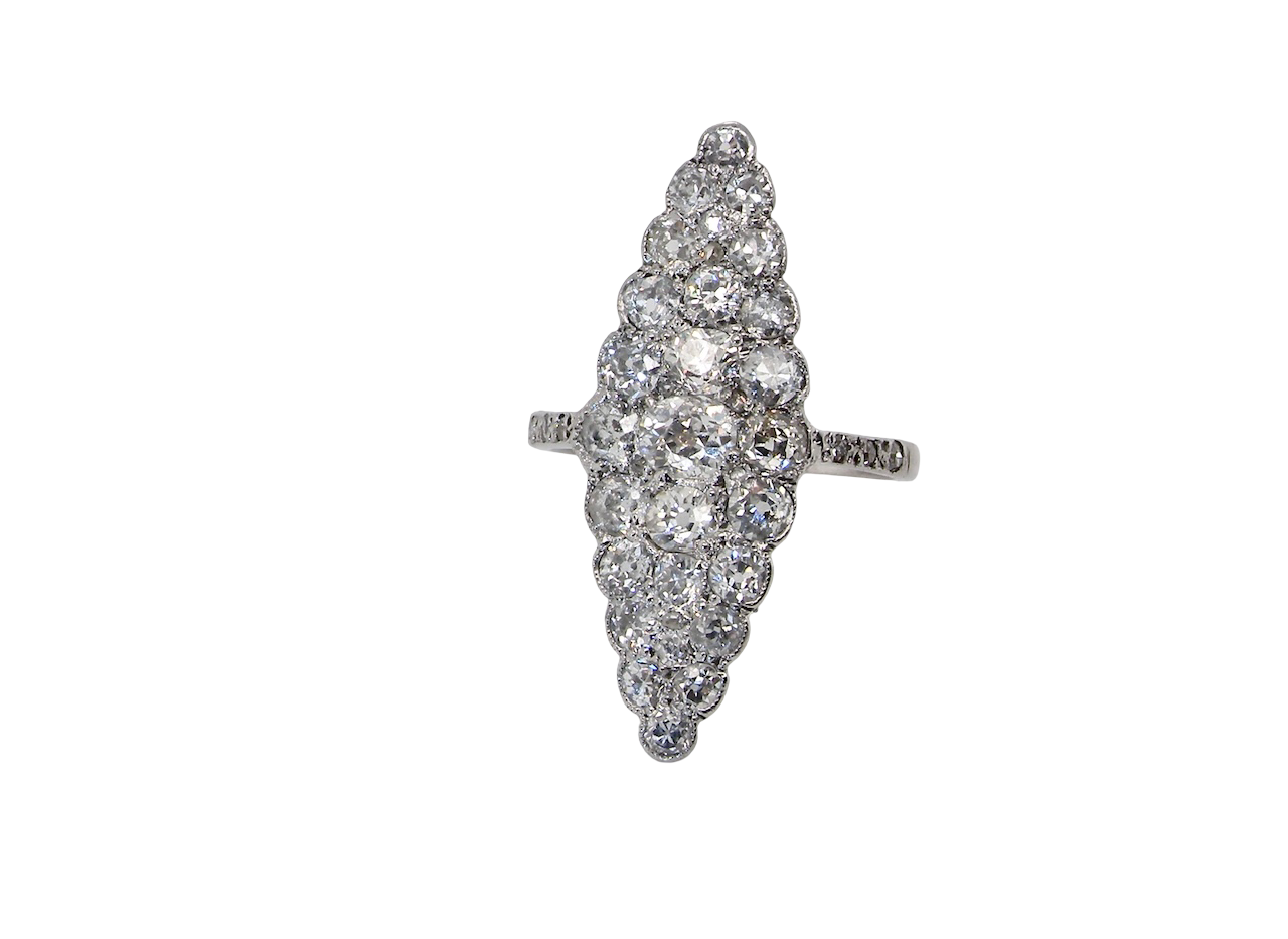 This is a striking marquise-shaped diamond cluster ring with a very classic, vintage look.