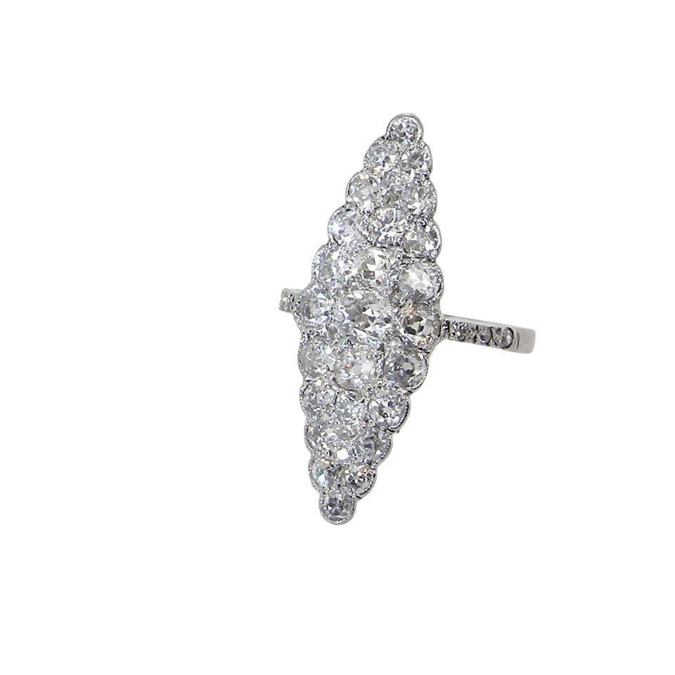 This is a striking marquise-shaped diamond cluster ring with a very classic, vintage-inspired look.