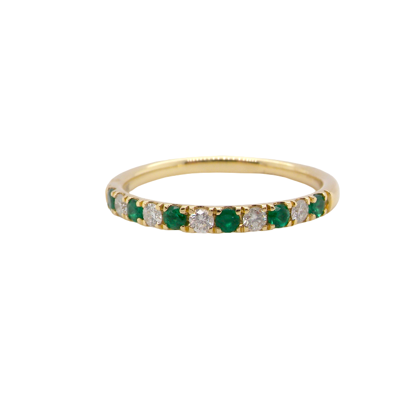 This ring is set with six bright green emeralds, each 2mm,and five 2mm brilliant cut white diamonds.
