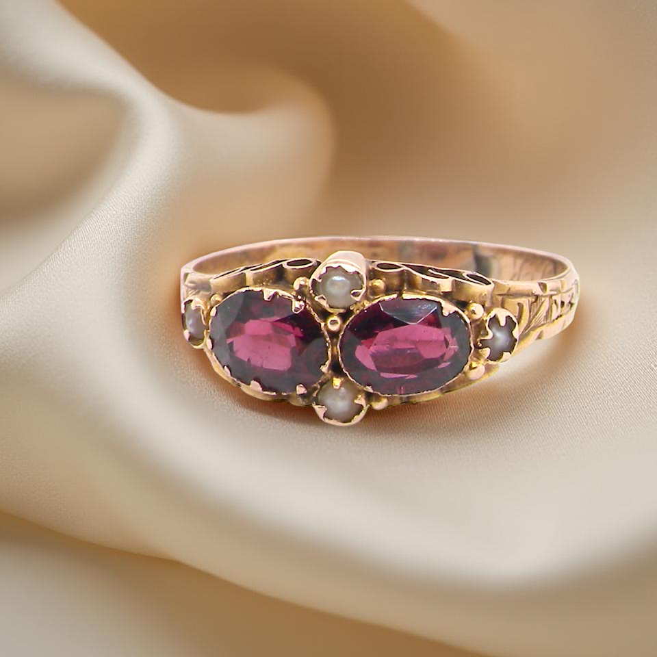 Victorian dress ring, beautifully set with matching oval-cut garnets
