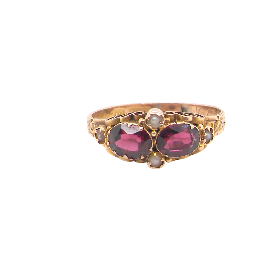 Victorian dress ring, beautifully set with two matching oval-cut garnets