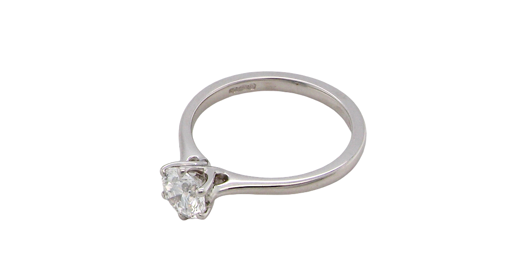 above ring is set with a superb GIA-certified brilliant-cut diamond, certificate no. 1383174901, weighing 0.70 carat. The diamond is of exceptional quality, graded D colour and VVS1 clarity, with excellent cut and polish and no fluorescence. Measurements: 5.48 x 5.67mm.