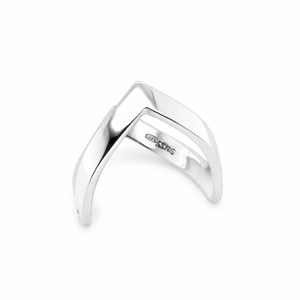 above view A 9 carat white gold double wishbone ring. with a diamond