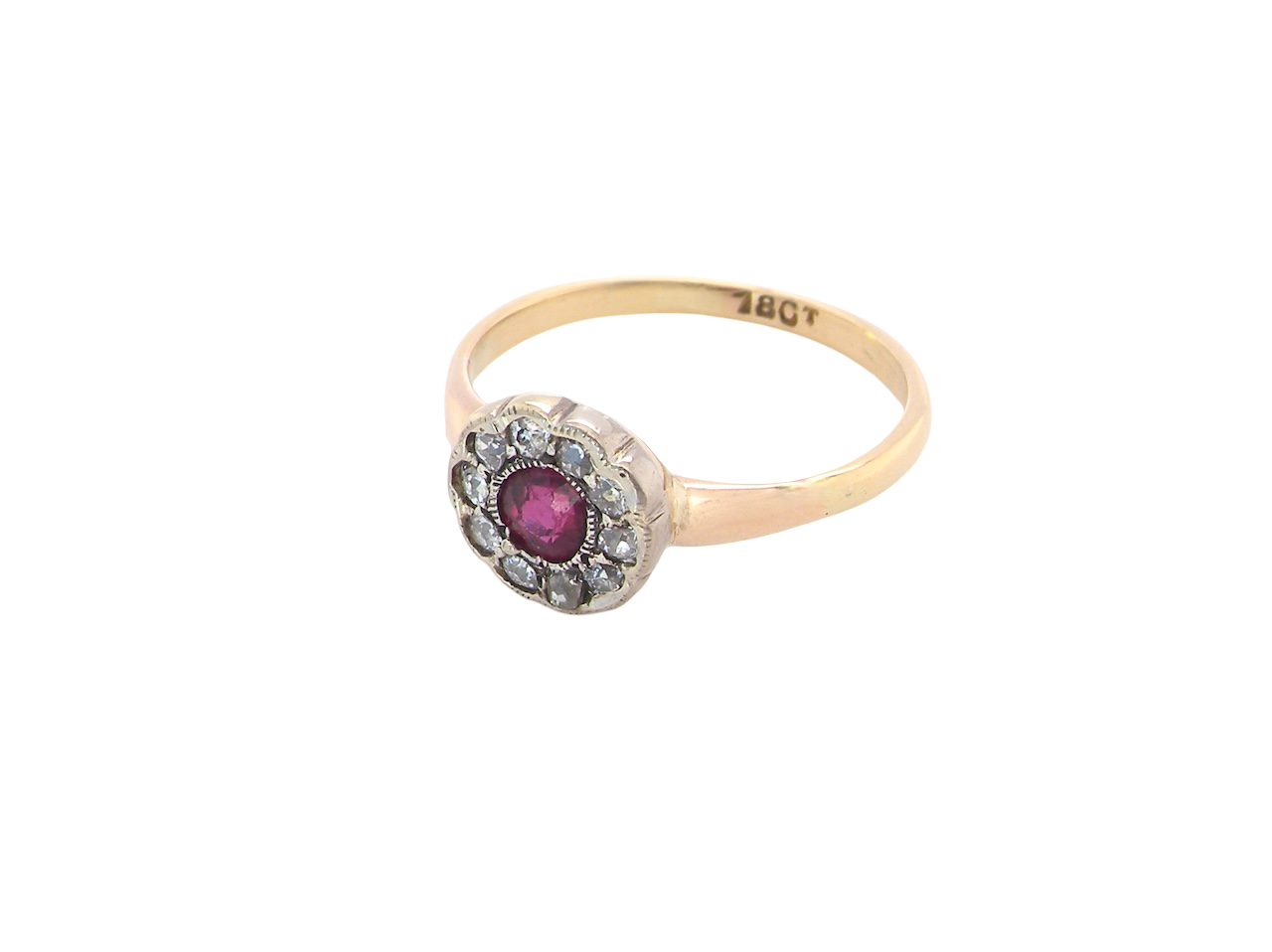 angle view A very pretty vintage daisy cluster ring. Features to the centre a round pink red ruby that measures 4mm, and is mille grain set.