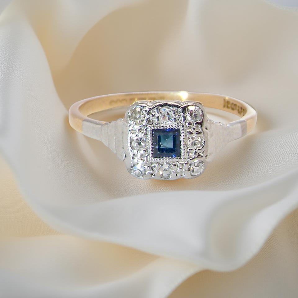 antique cluster ring. small square sapphire