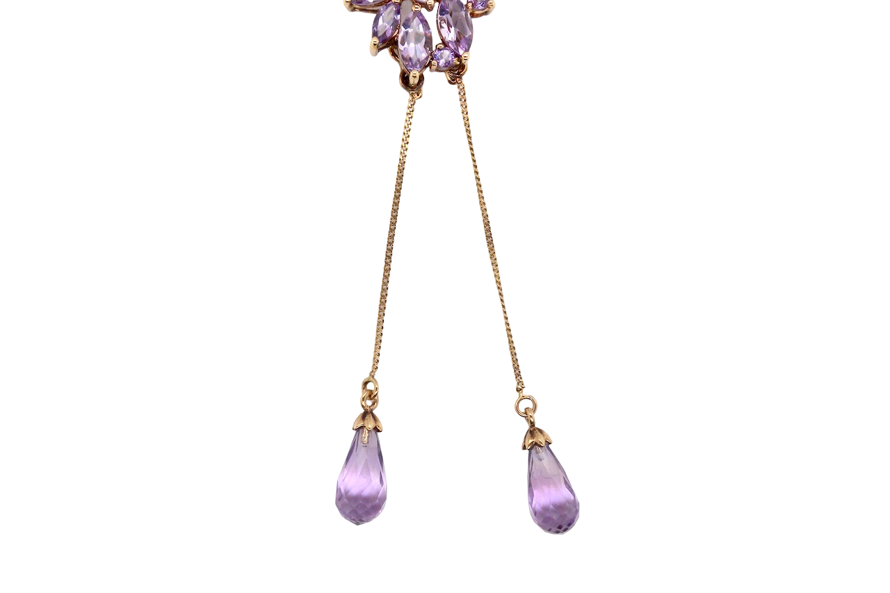 Purple teardrop earrings with gold accents on a white background