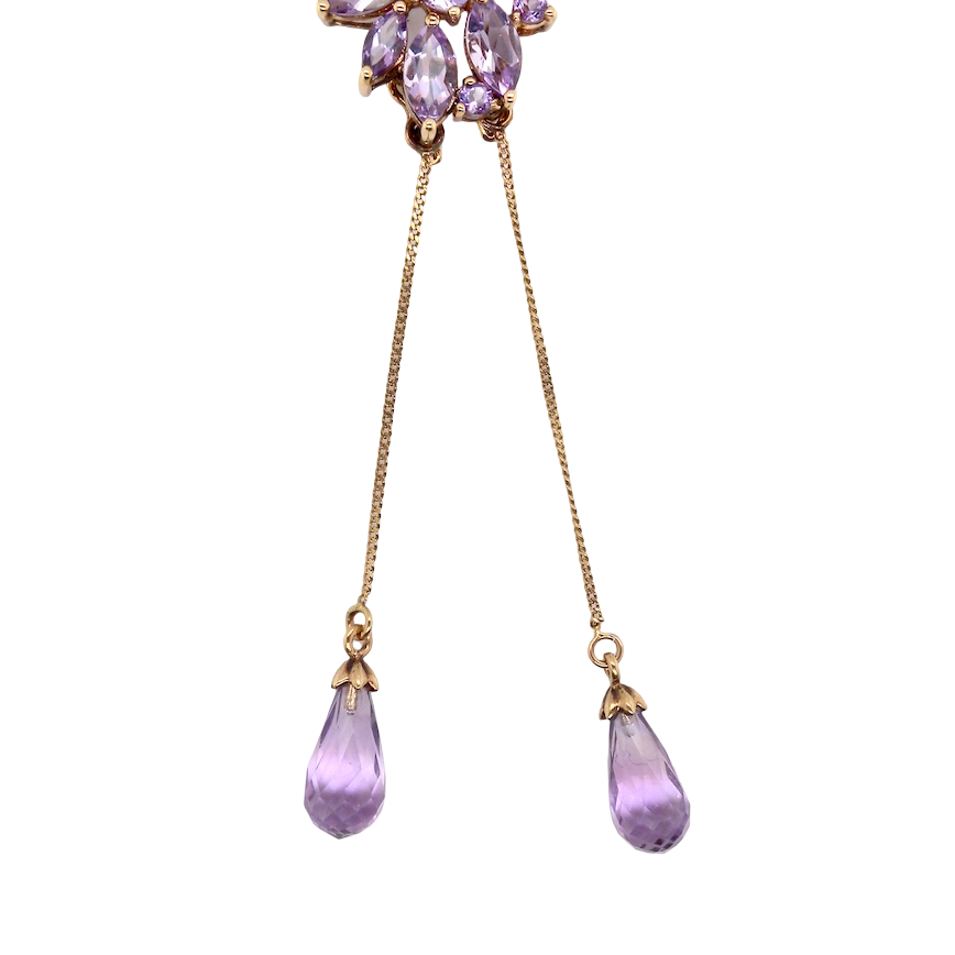 Purple teardrop earrings with gold accents on a white background