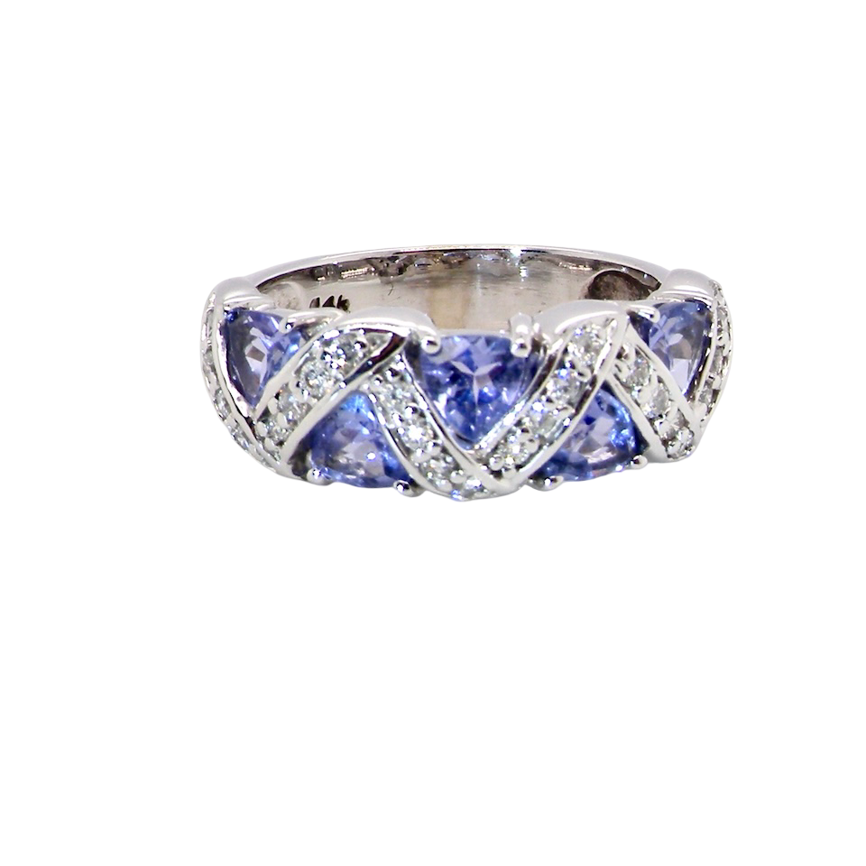beautiful and eye-catching dress ring set in 14ct white gold, featuring five triangular tanzanite gemstones