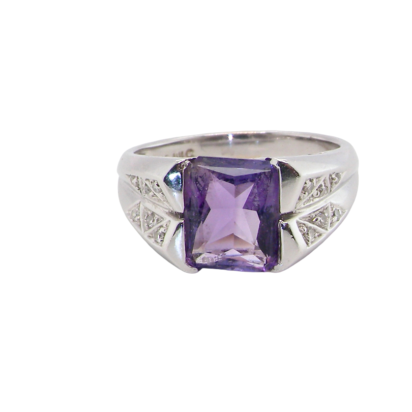 beautiful dress ring crafted in 14ct white gold (stamped 585), featuring a stunning rectangular-cut Tanzanite measuring approximately 9 x 7.5mm, estimated at 2.5 carats.
