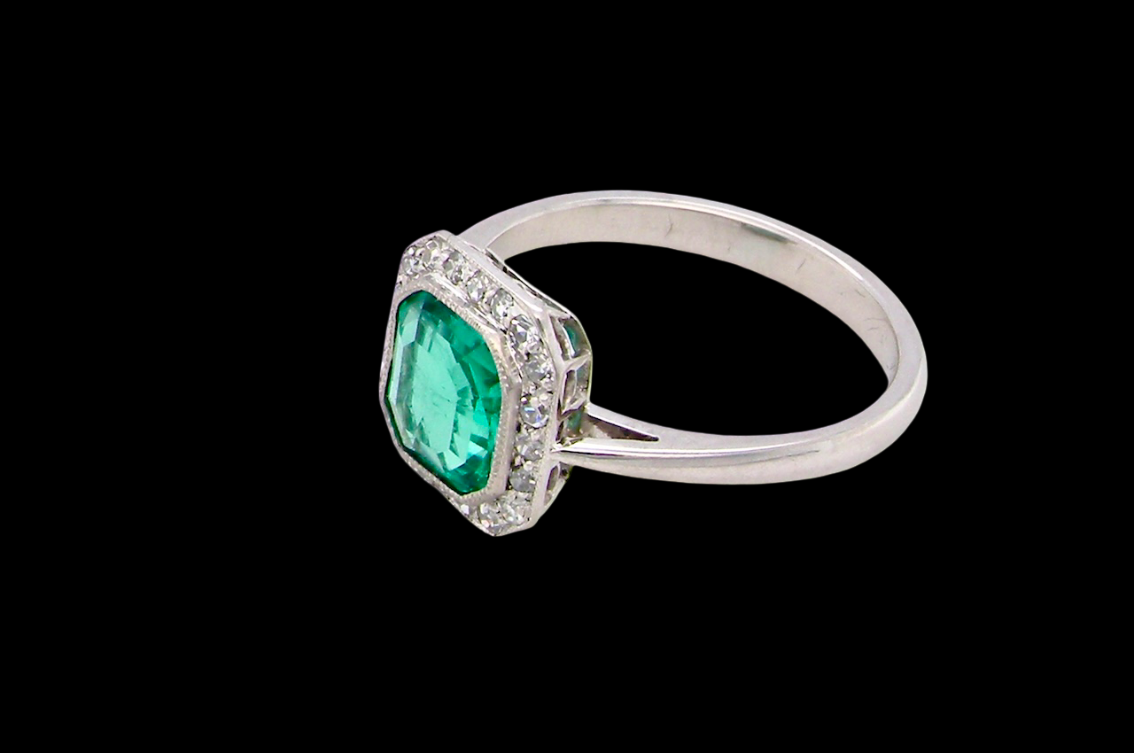 beautiful emerald rings we have had in our collections. The ring from the Art Deco period is set with an exquisite emerald centre stone.
side