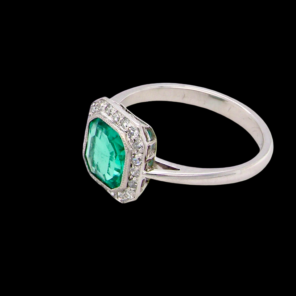 beautiful emerald rings we have had in our collections. The ring from the Art Deco period is set with an exquisite emerald centre stone.
side