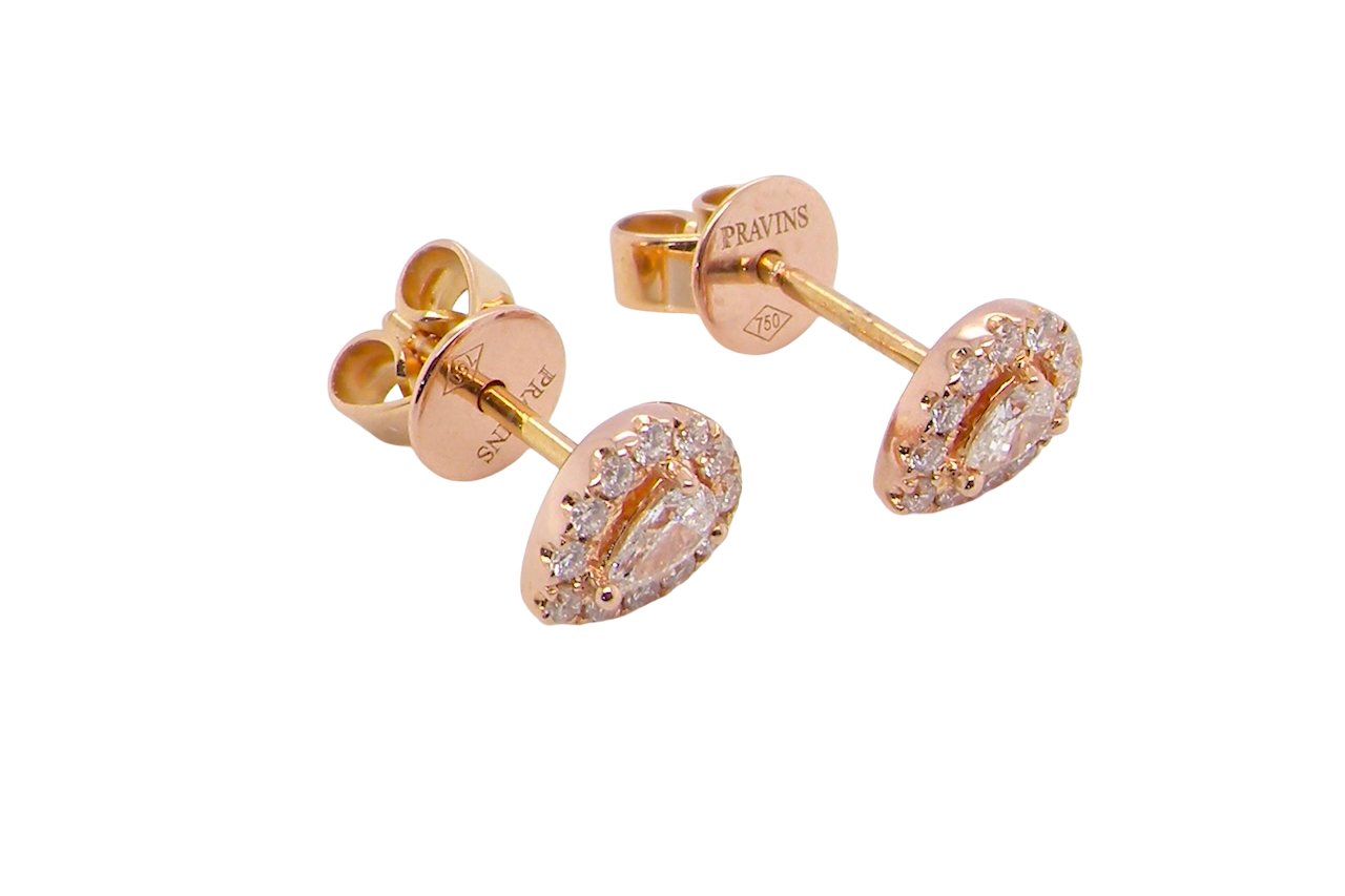 beautiful pair of pear-shaped earrings set with white diamonds.