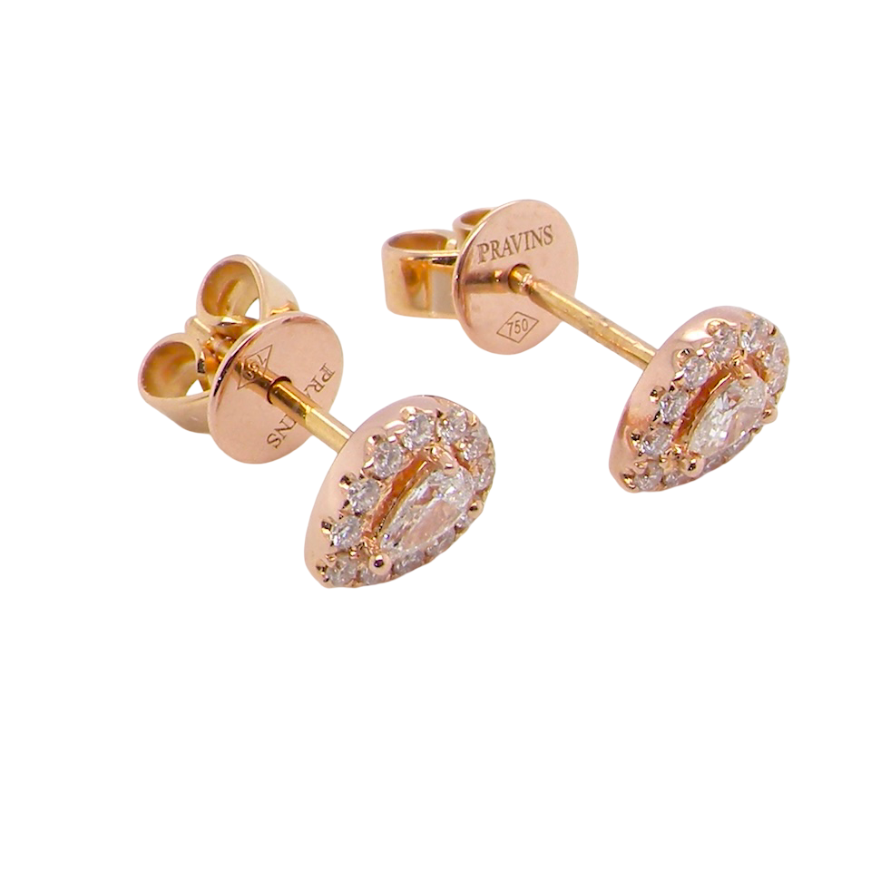 beautiful pair of pear-shaped earrings set with white diamonds.