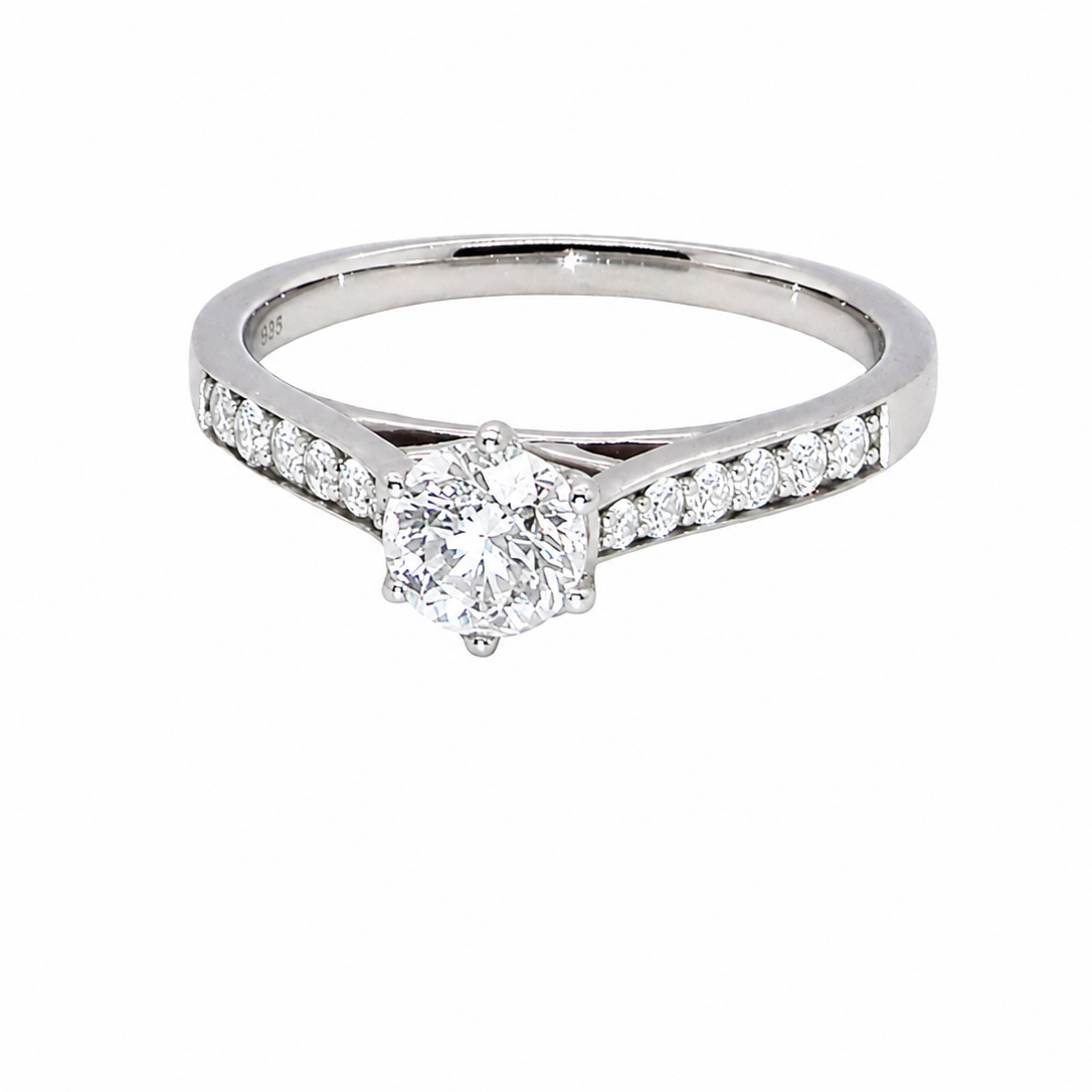 beautiful platinum solitaire ring featuring a brilliant-cut white diamond, claw set, measuring 4.8mm and weighing approximately 0.65ct. Diamond graded I colour, SI1 clarity, with an 88-facet cut.