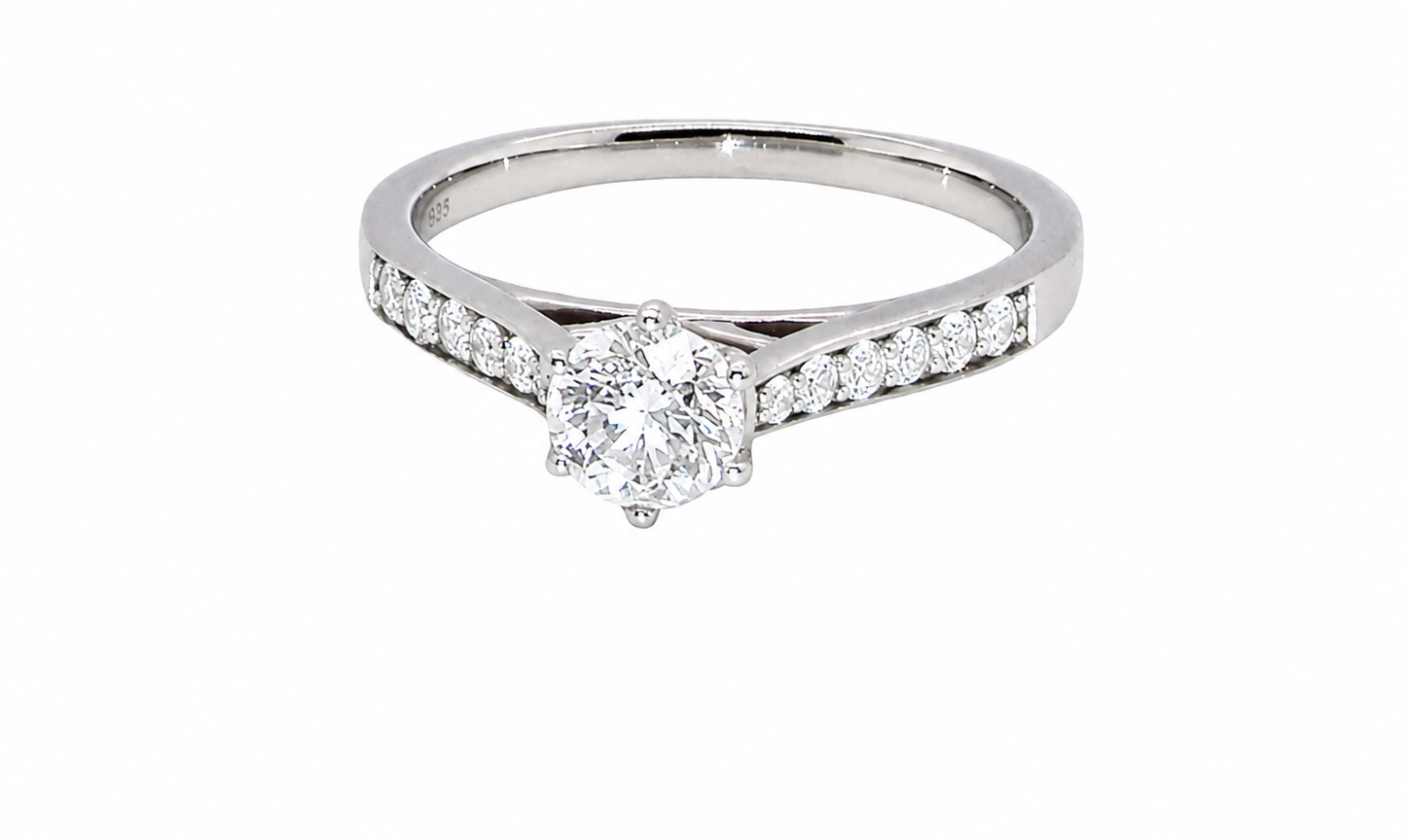 beautiful platinum solitaire ring featuring a brilliant-cut white diamond, claw set, measuring 4.8mm and weighing approximately 0.65ct. Diamond graded I colour, SI1 clarity, with an 88-facet cut.