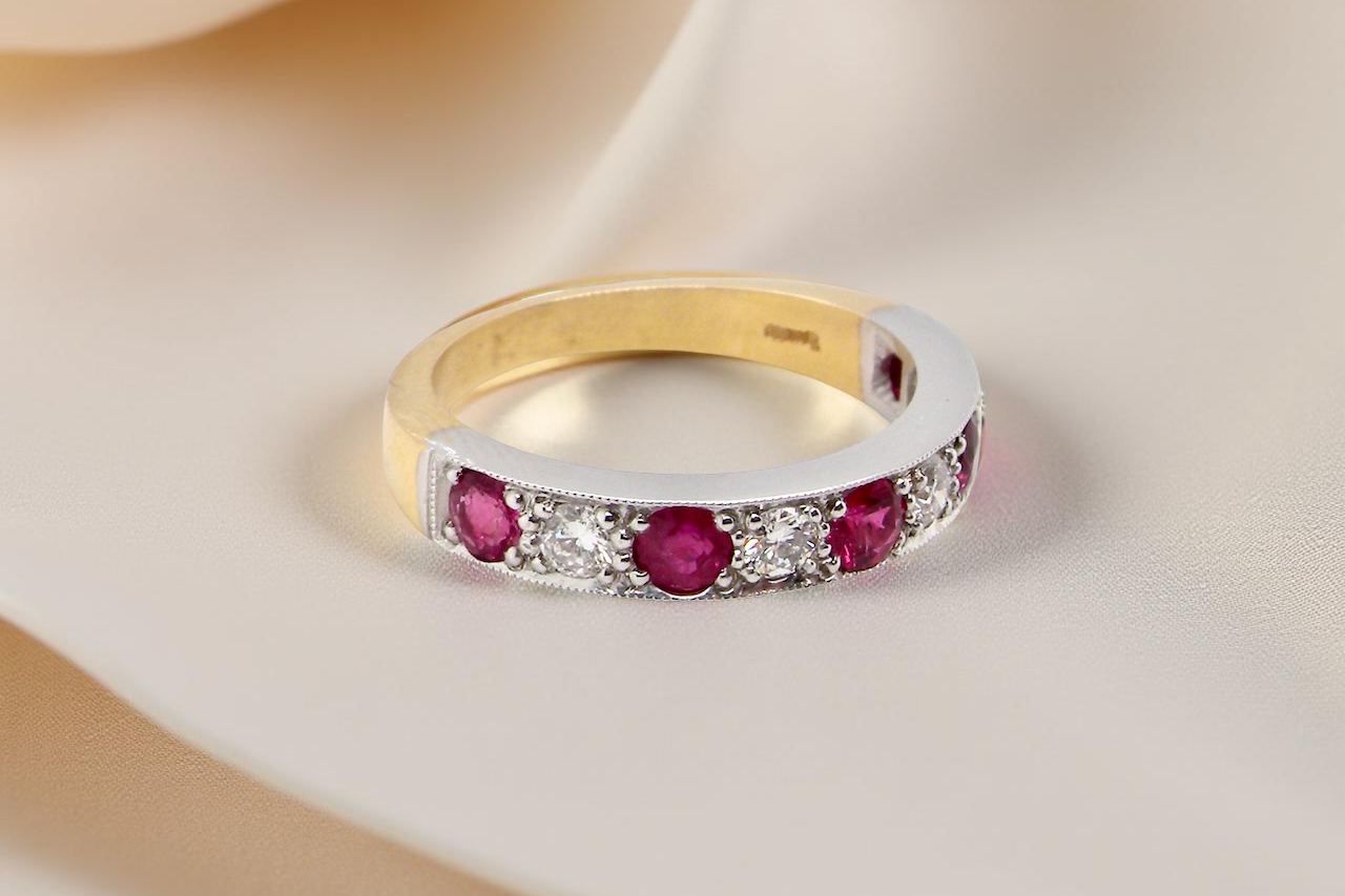 beautifully crafted 18 carat gold half-hoop eternity ring, A