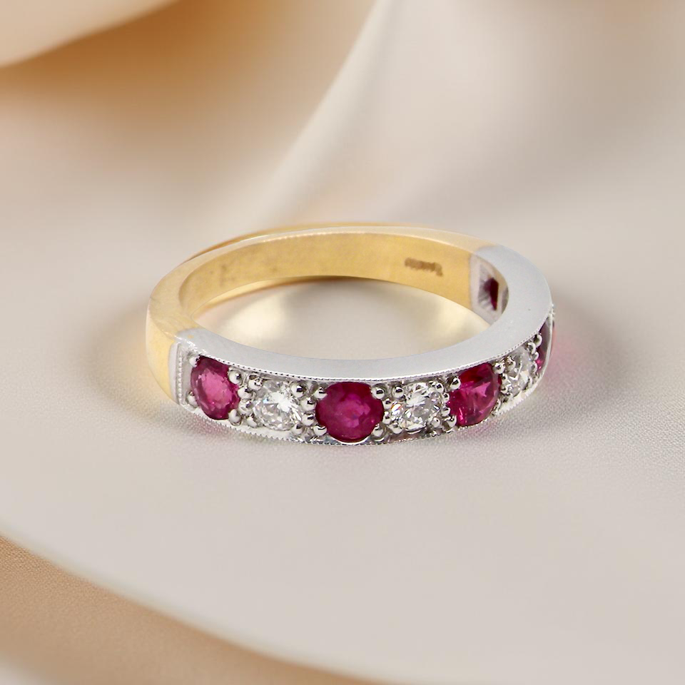 beautifully crafted 18 carat gold half-hoop eternity ring, A