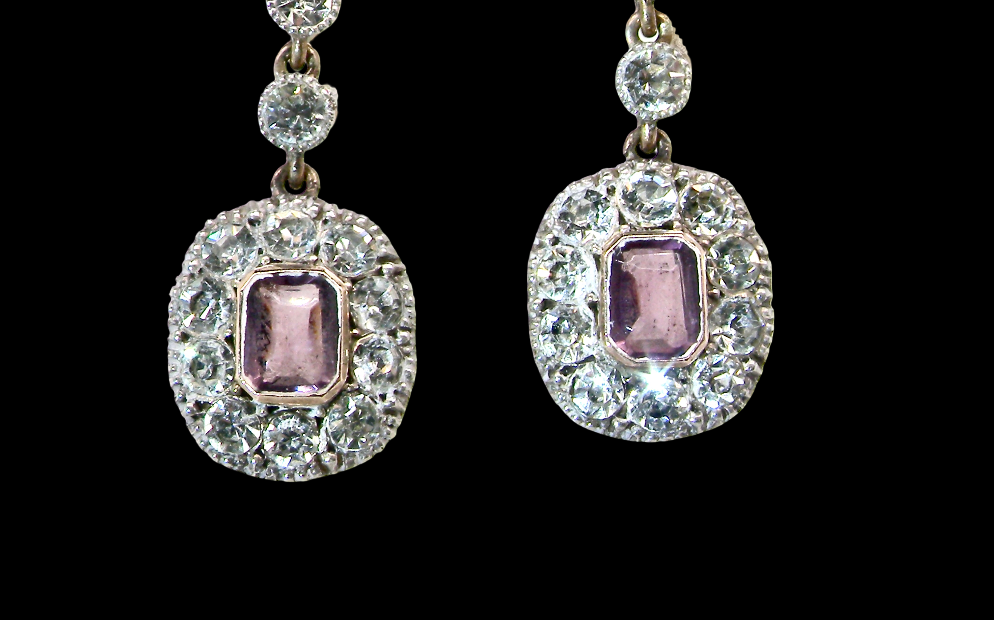 bottom view pair of drop earrings from. the glamour era of the Edwardian era.